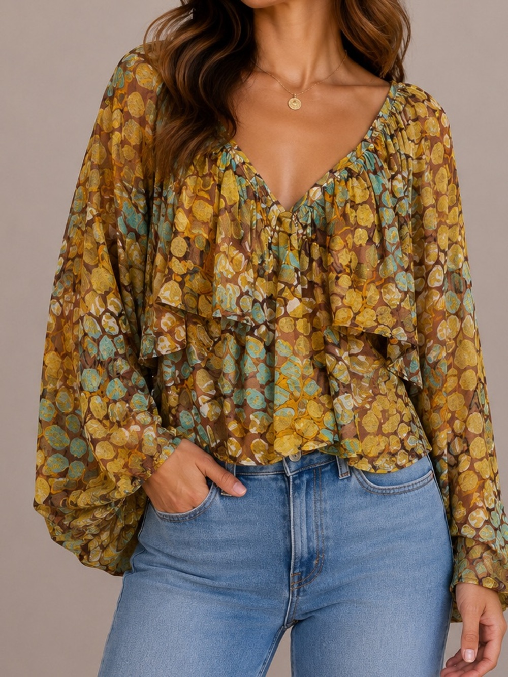 boho-style peasant blouse with billowy long sleeves and an abstract floral small